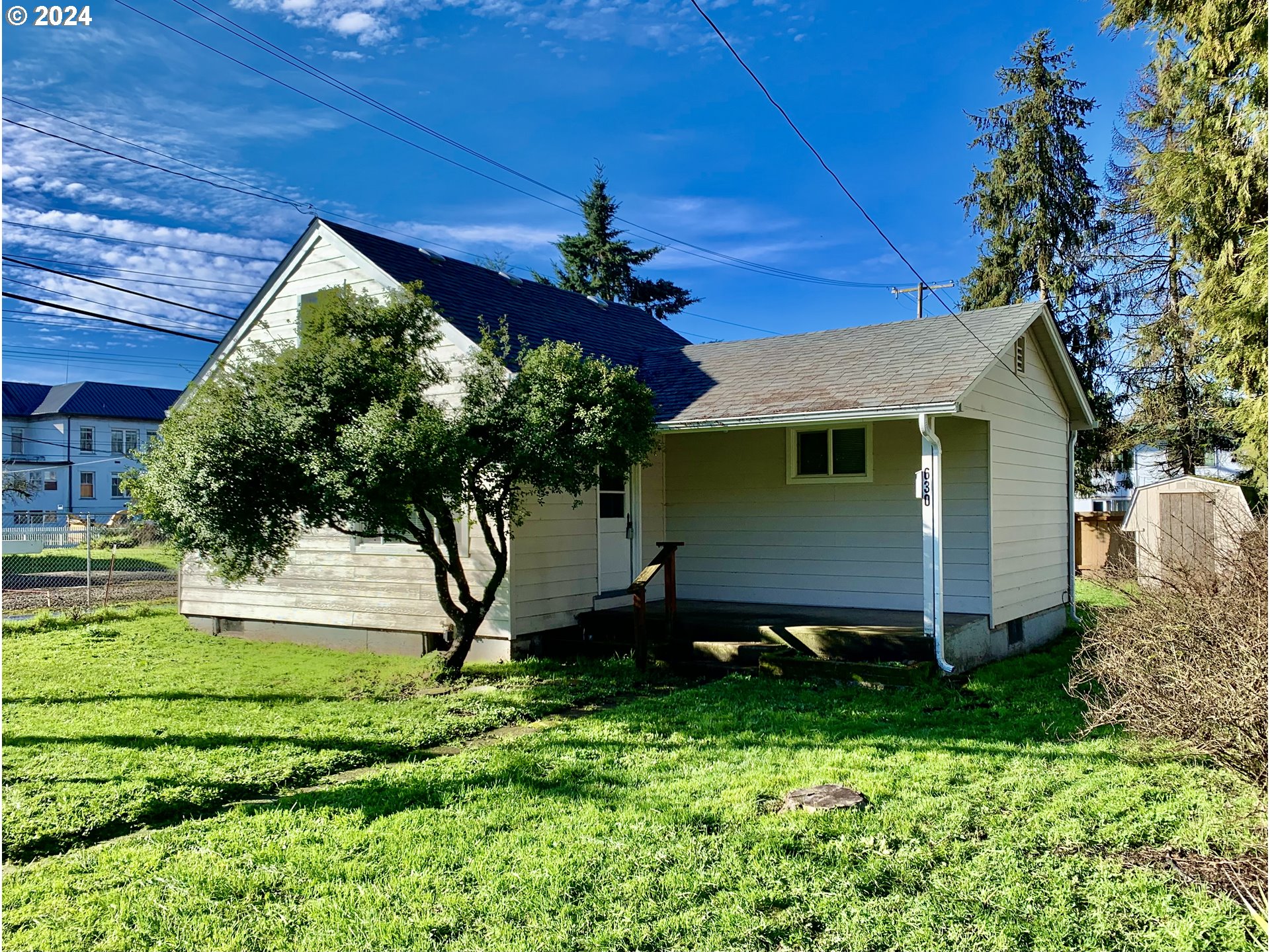 630 1st Street Springfield, OR 97477 - Photo 2 of 18 a view of a house with a yard