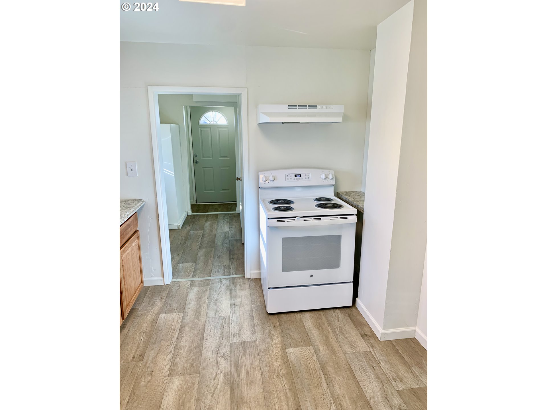 630 1st Street Springfield, OR 97477 - Photo 4 of 18 a view of kitchen and utility room
