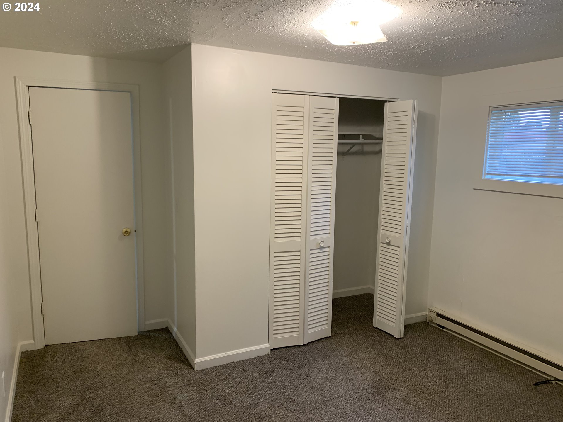 630 1st Street Springfield, OR 97477 - Photo 10 of 18 an empty room with windows