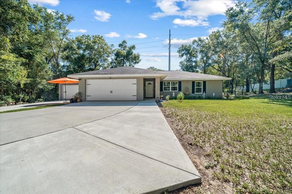 543 North Rooks Avenue Inverness, FL 34453 - Photo 3 of 14 a view of a house with a yard