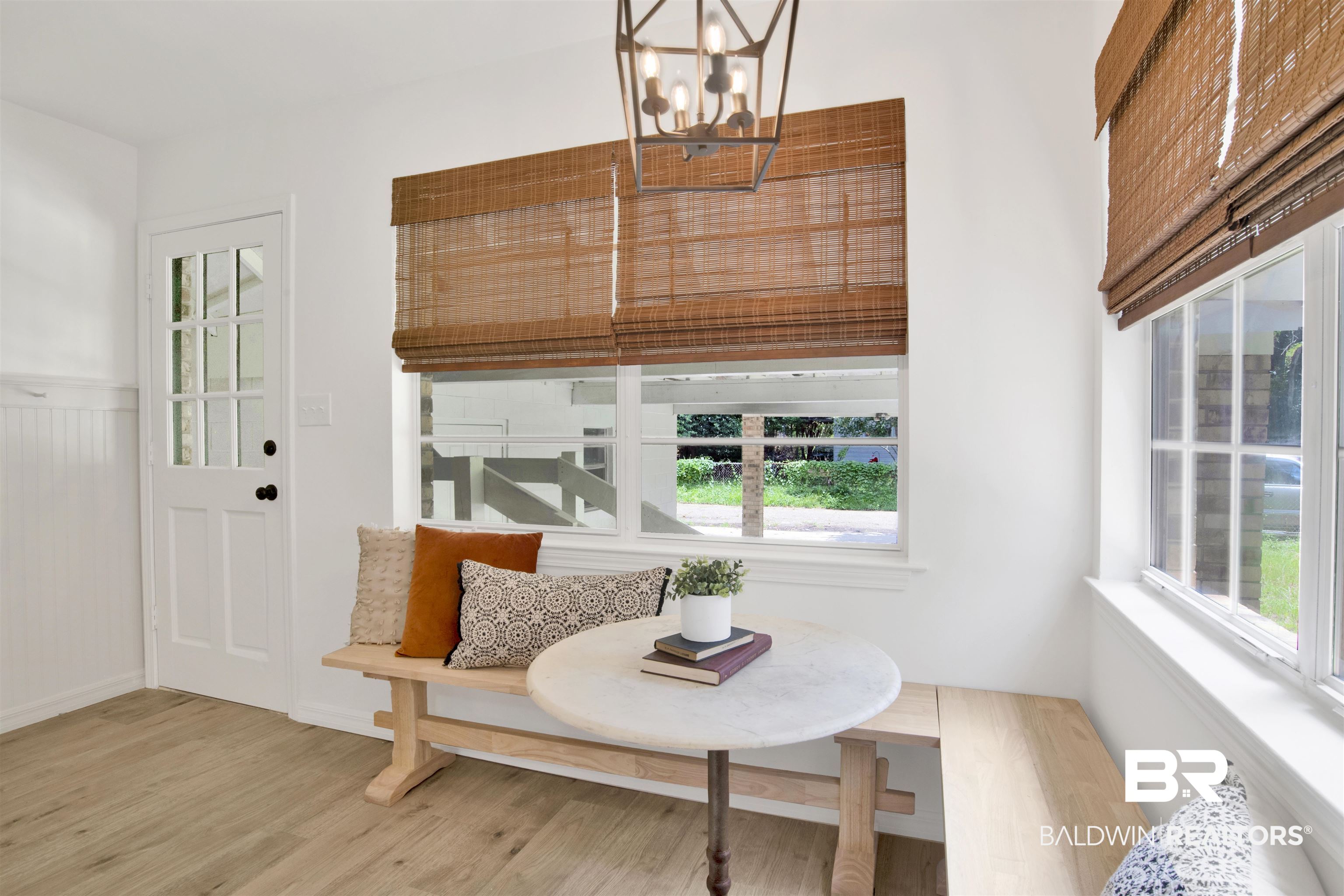 317 Lee Street Chickasaw, AL 36611 - Photo 31 of 40 Sunroom featuring plenty of natural light and a chandelier