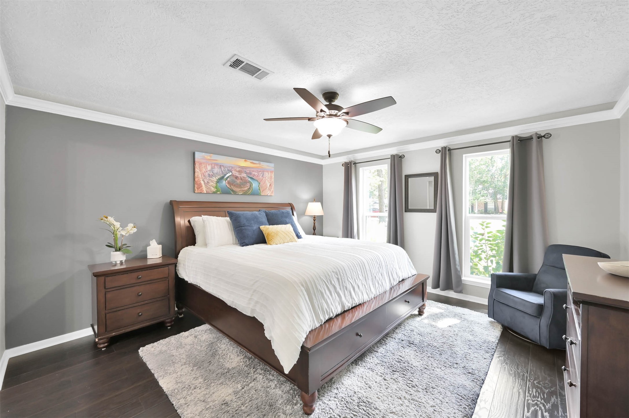 223 Birchwood Drive Spring, TX 77386 - Photo 21 of 40 a bedroom with a large bed and a couch