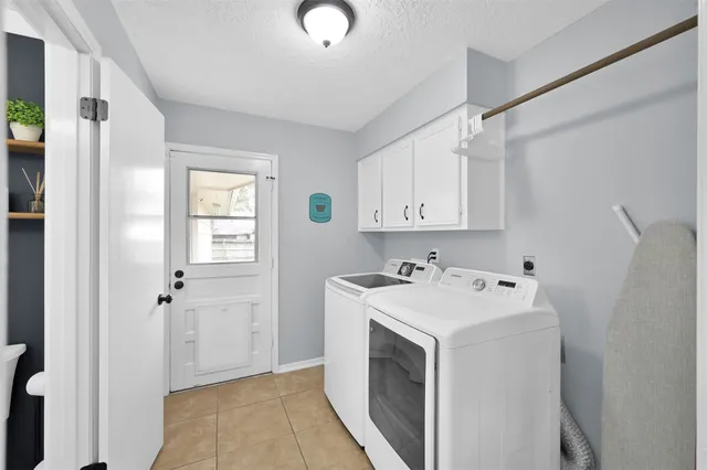 a view of utility room with washer and dryer