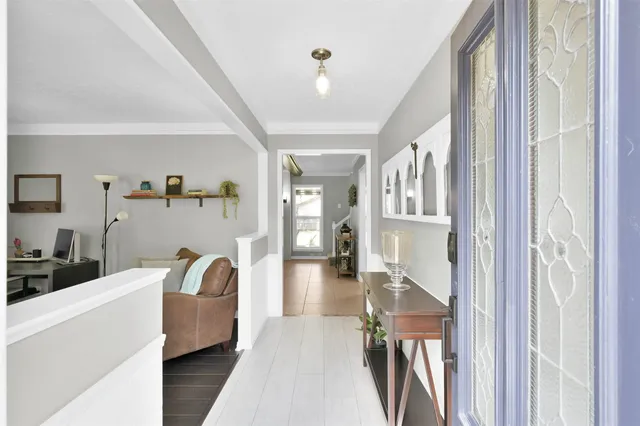 a living room with furniture and a table