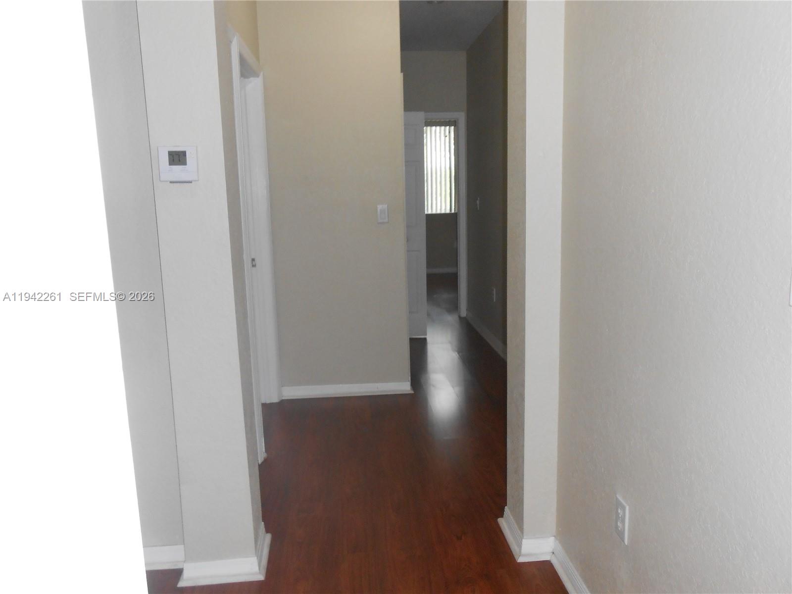 12470 Southwest 122nd Street Miami, FL 33186 - Photo 16 of 26 a view of a hallway