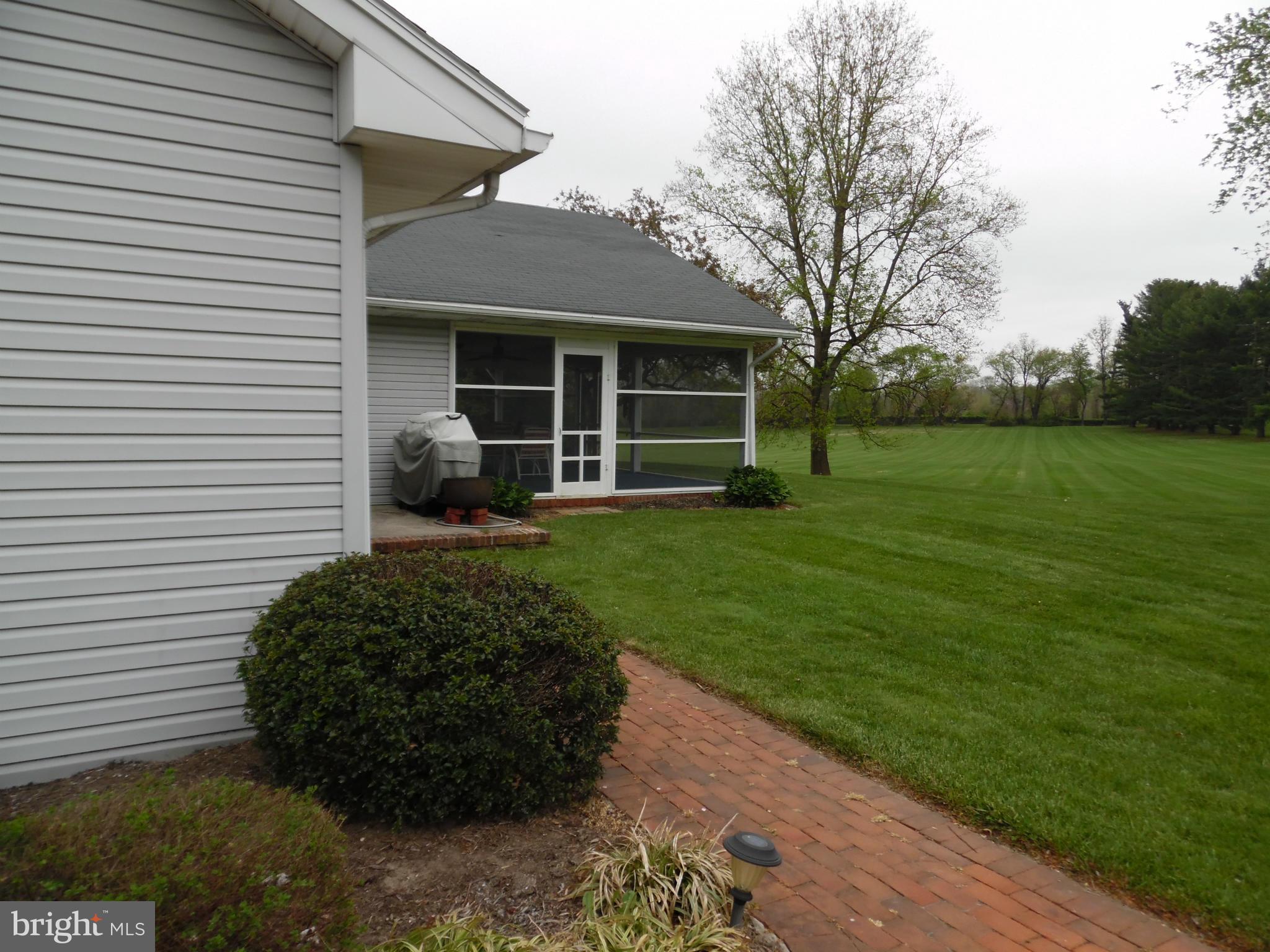 15031 Priceville Road Sparks, MD 21152 - Photo 3 of 4 a view of a house with backyard and garden