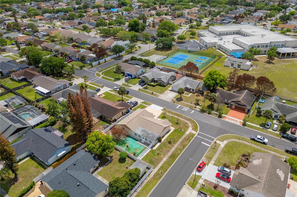 2779 Muscatello Street Orlando, FL 32837 - Photo 6 of 36 an aerial view of residential houses with outdoor space