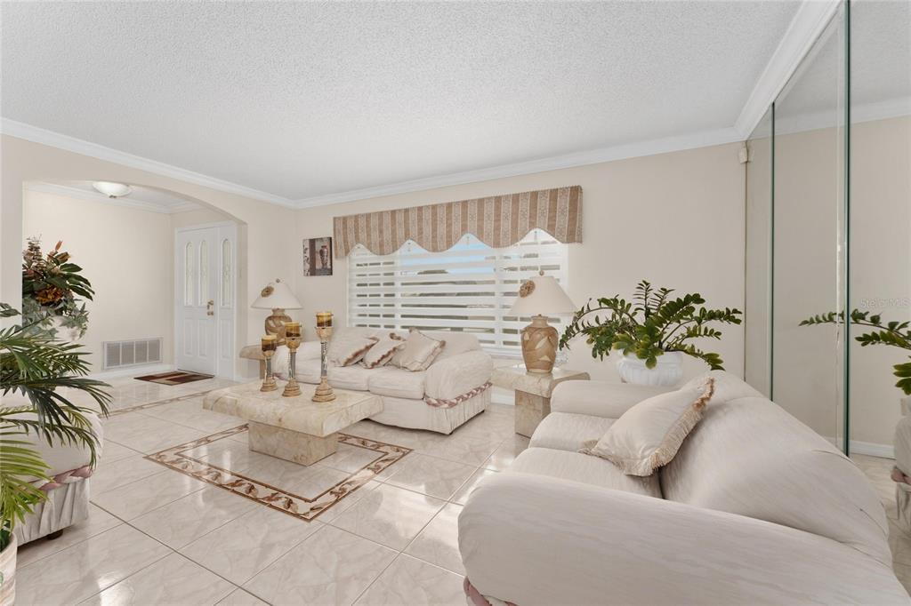 2779 Muscatello Street Orlando, FL 32837 - Photo 9 of 36 a living room with furniture