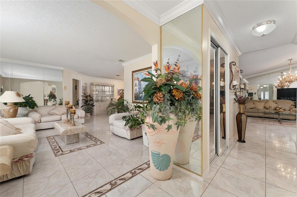 2779 Muscatello Street Orlando, FL 32837 - Photo 10 of 36 a living room with furniture and a potted plant