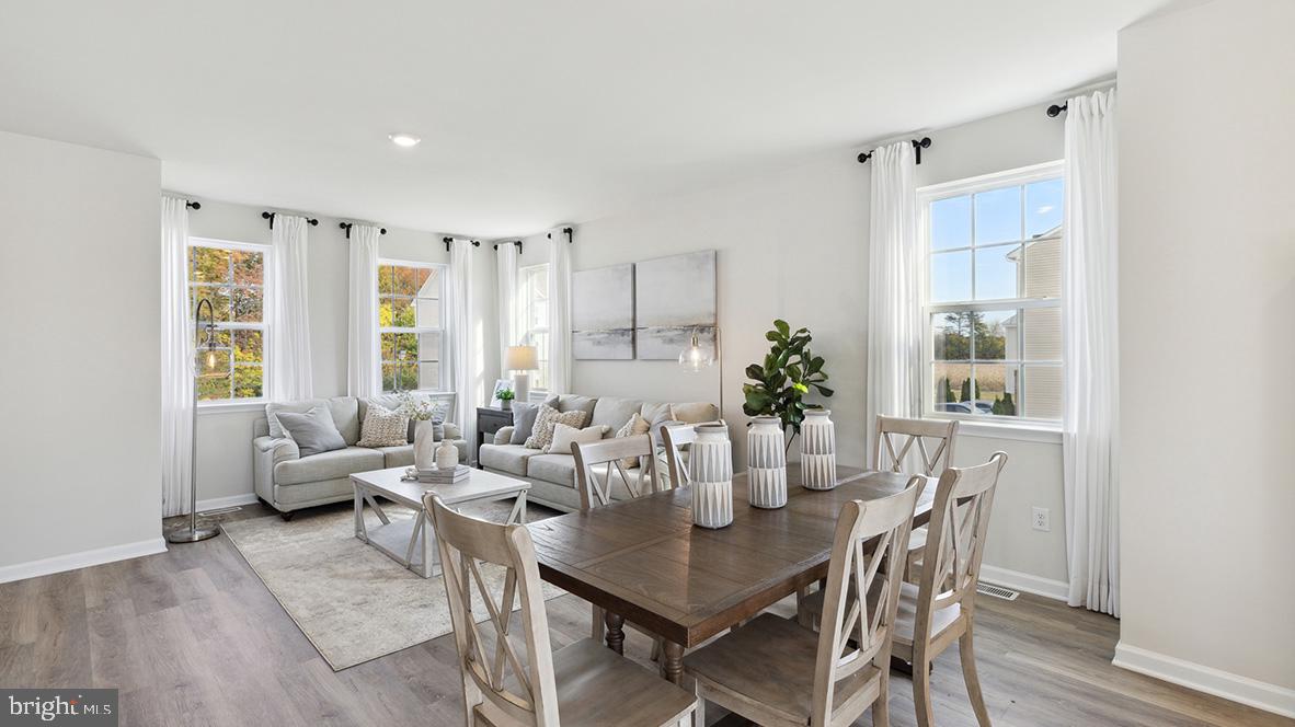 14 Baybreeze Drive Waretown, NJ 08758 - Photo 11 of 27 a view of a dining room with furniture and wooden floor