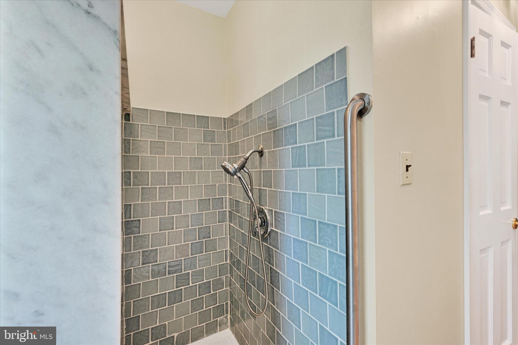 9115 Kilbride Road Baltimore, MD 21236 - Photo 23 of 61 a bathroom with a shower
