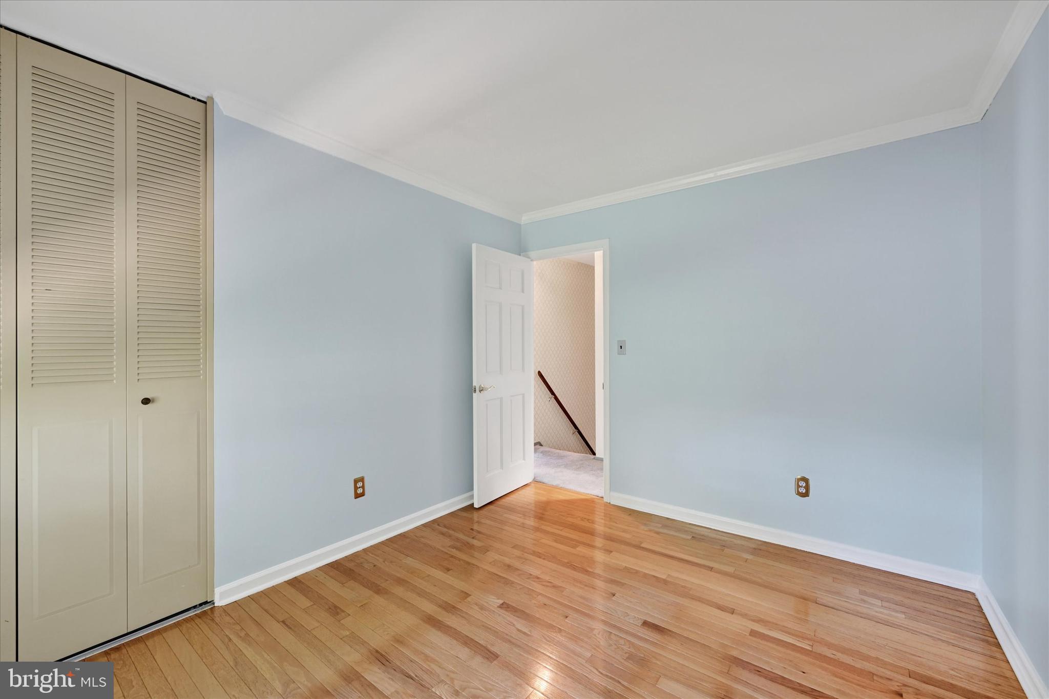 9115 Kilbride Road Baltimore, MD 21236 - Photo 27 of 61 a view of an empty room with wooden floor