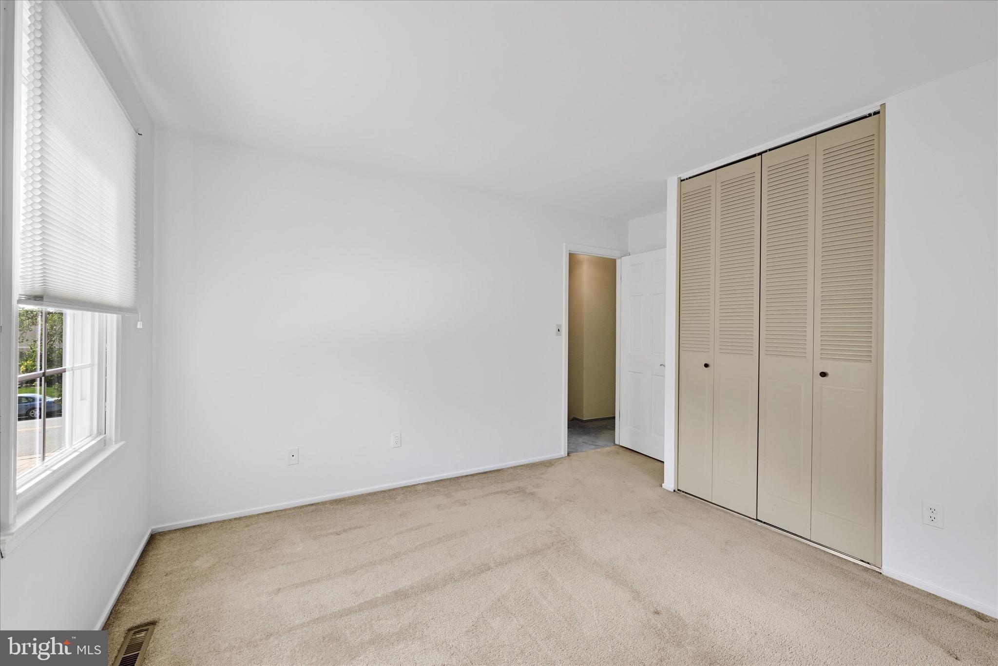 9115 Kilbride Road Baltimore, MD 21236 - Photo 29 of 61 a view of an empty room with a window