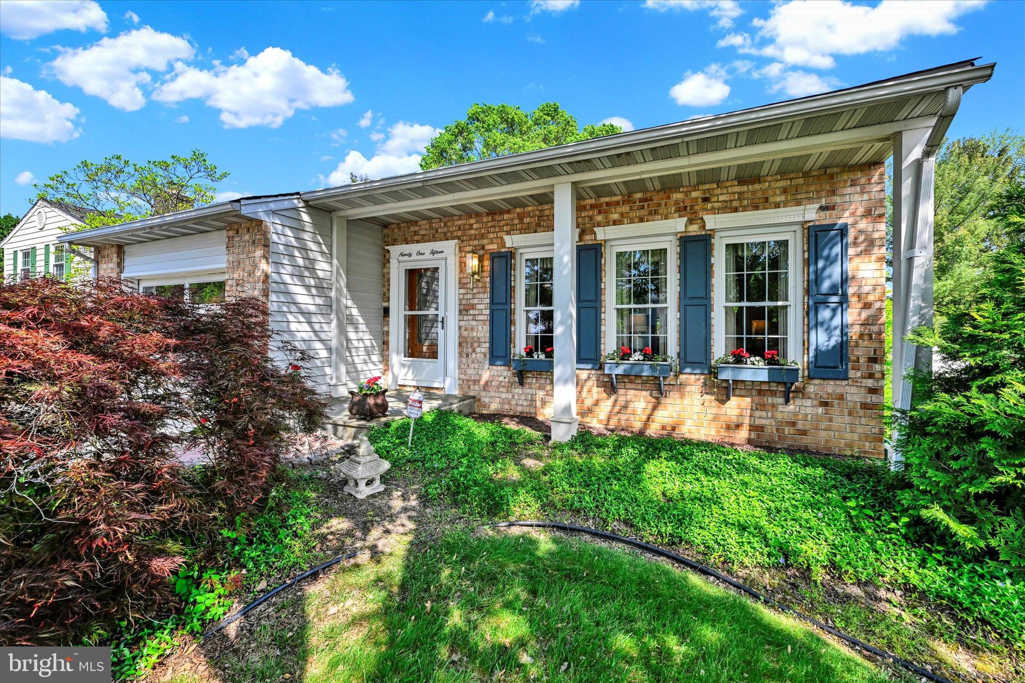 9115 Kilbride Road Baltimore, MD 21236 - Photo 52 of 61 front view of a house with a yard