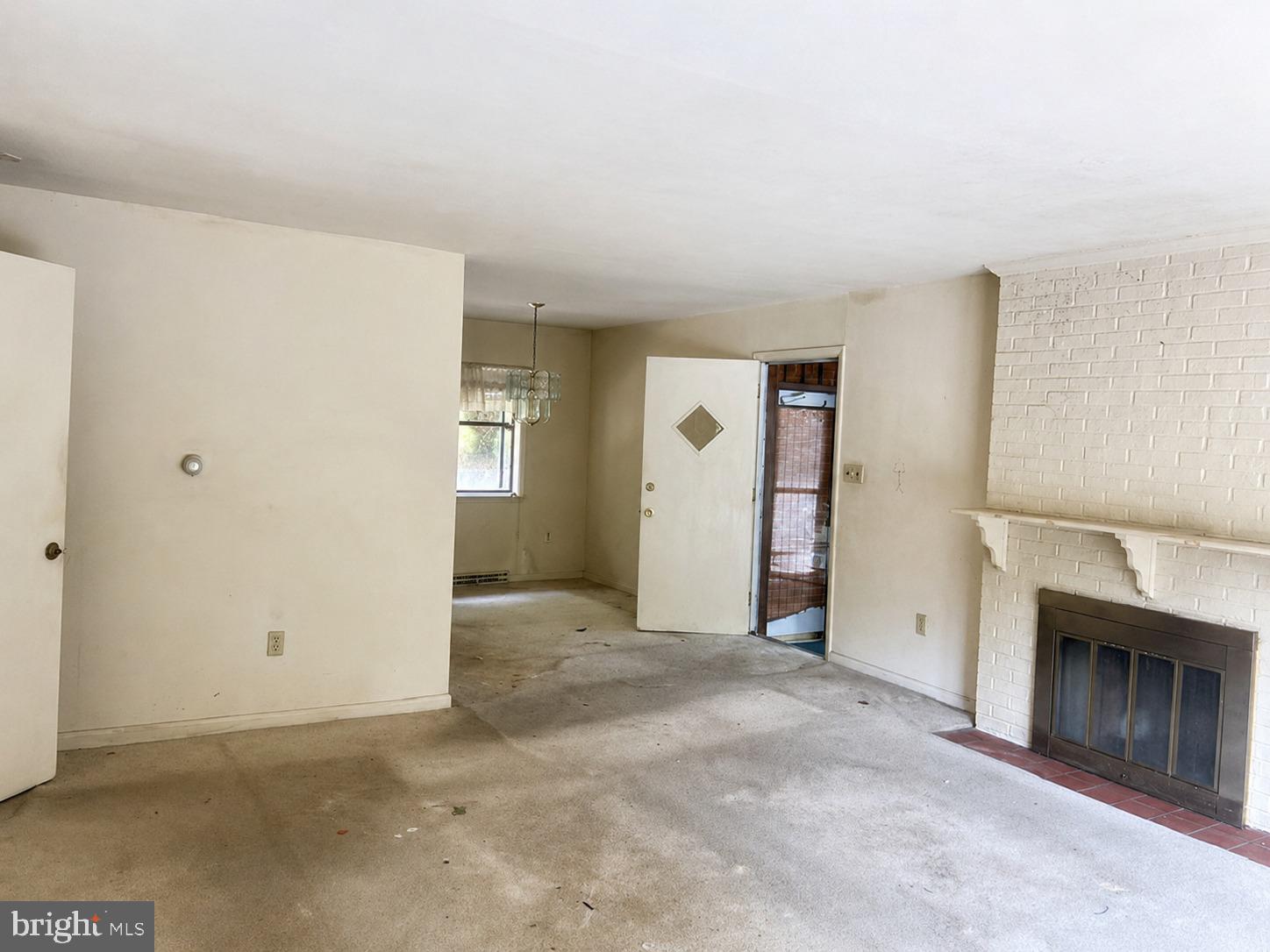 6725 Glenkirk Road Baltimore, MD 21239 - Photo 4 of 25 Livingroom with Fireplace