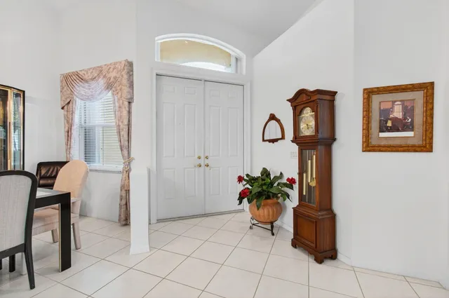 a living room with fireplace furniture and a flat screen tv