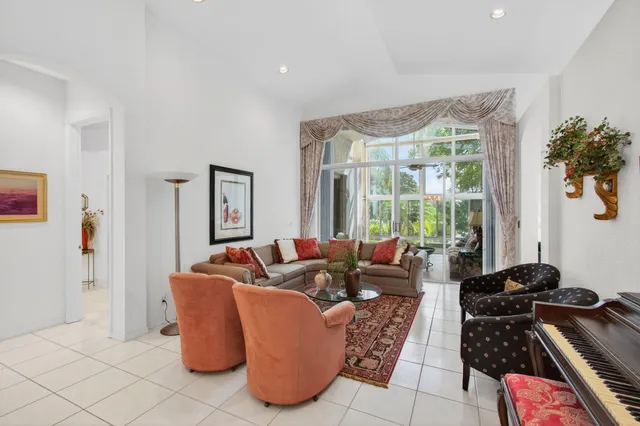 a kitchen with granite countertop a sink and a stove top oven