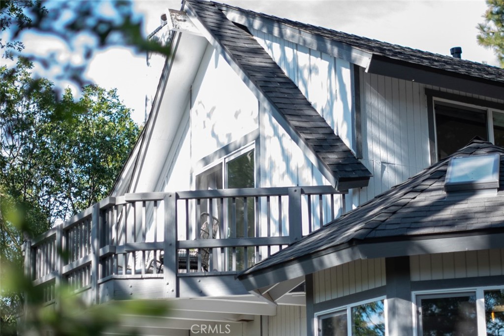 940 Highway 173 Lake Arrowhead, CA 92352 - Photo 22 of 45 a view of staircase with white walls and railing