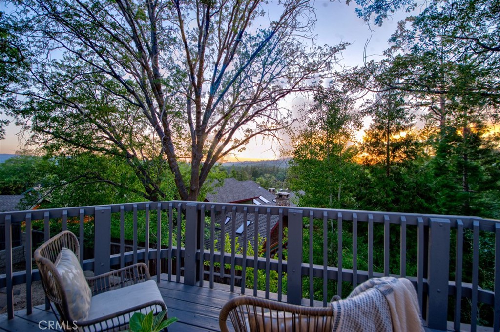 940 Highway 173 Lake Arrowhead, CA 92352 - Photo 23 of 45 a view of a deck with furniture and wooden deck