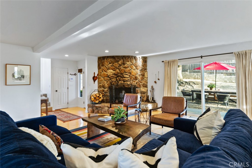 940 Highway 173 Lake Arrowhead, CA 92352 - Photo 4 of 45 a living room with furniture and a large window