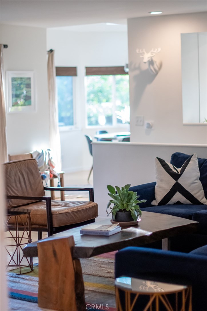 940 Highway 173 Lake Arrowhead, CA 92352 - Photo 5 of 45 a living room with couches chairs and a potted plant