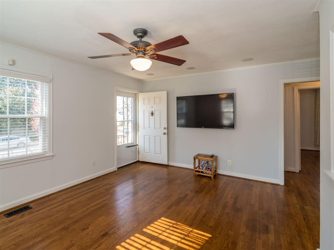 1800 Bennett Street Raleigh, NC 27604 - Photo 3 of 24 Alternate view of Living Room; front door is to the left. Bedrooms are through the doorways on the right. Living Room