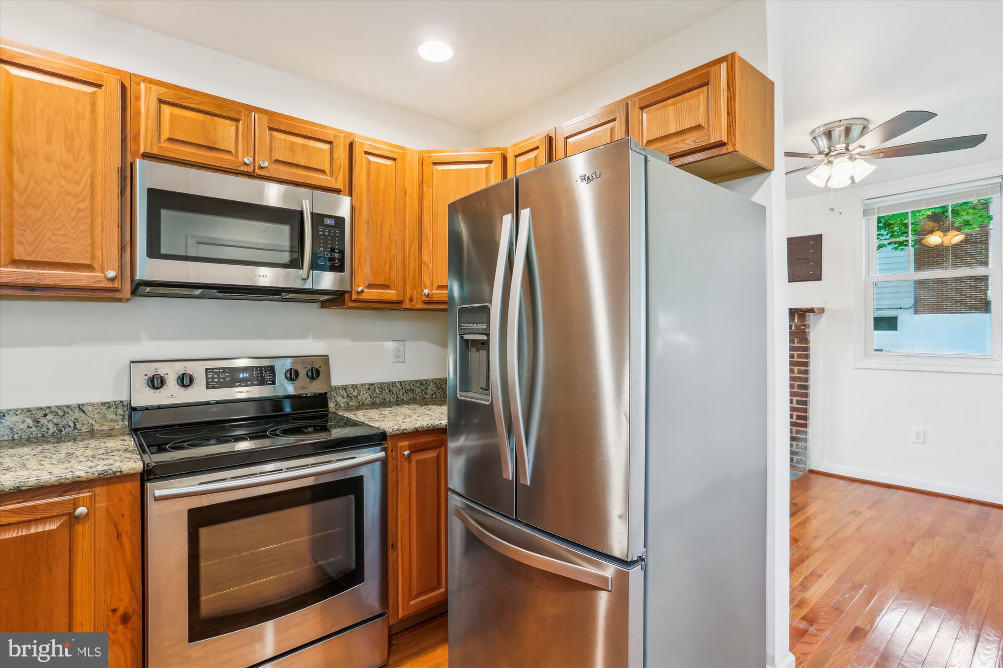 11008 Liberty Road Frederick, MD 21701 - Photo 18 of 39 a kitchen with stainless steel appliances granite countertop a refrigerator stove and microwave