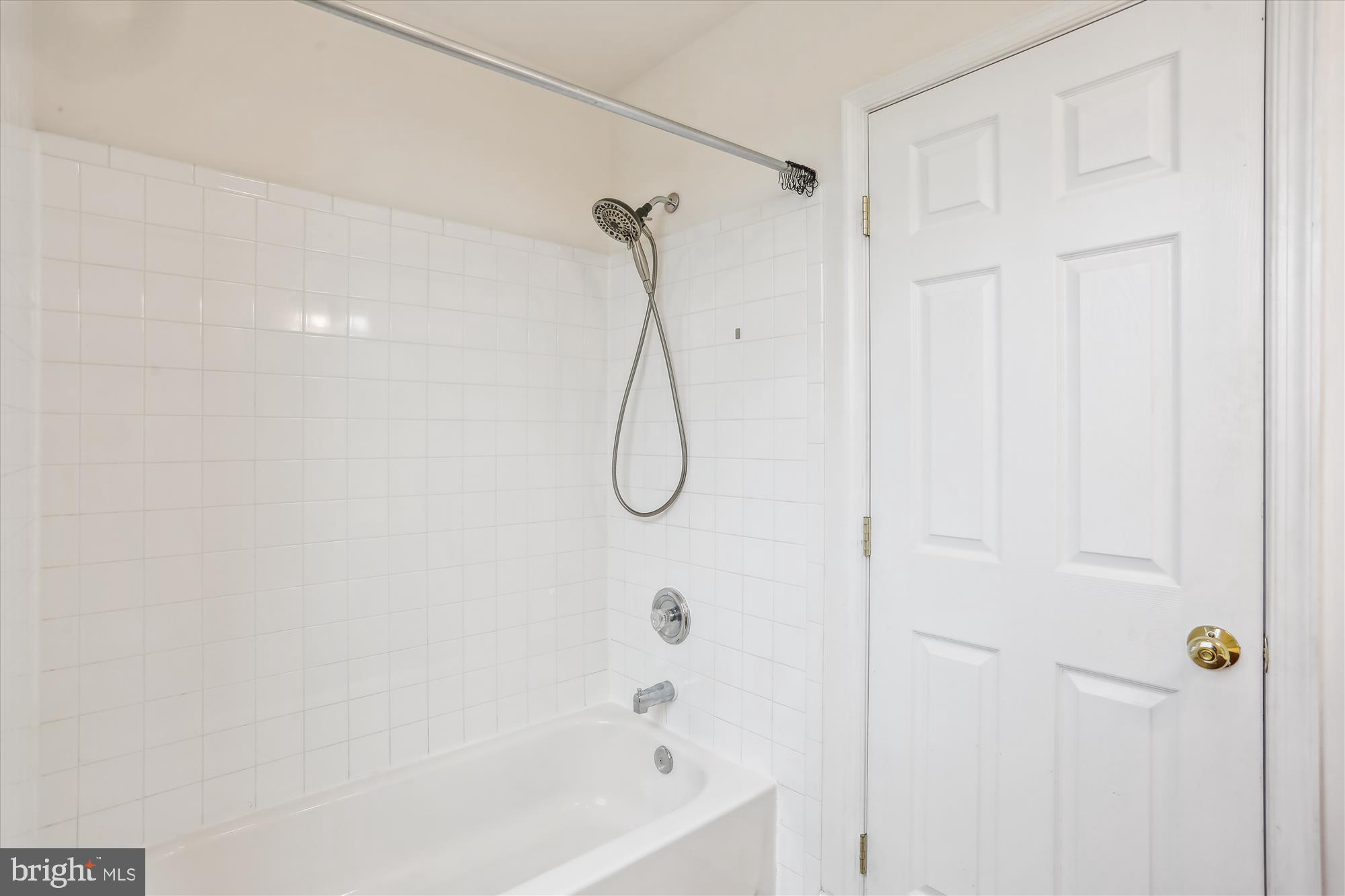 11008 Liberty Road Frederick, MD 21701 - Photo 27 of 39 a bathroom with a bath tub with a shower