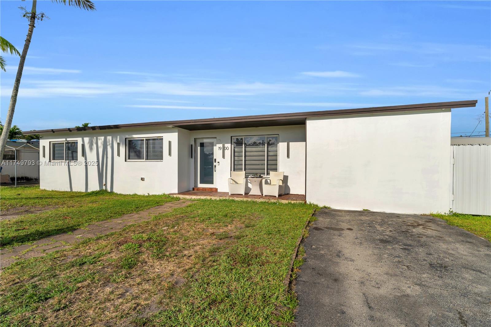 19900 Gulfstream Road Cutler Bay, FL 33157 - Photo 2 of 34 a view of a house with backyard and garden