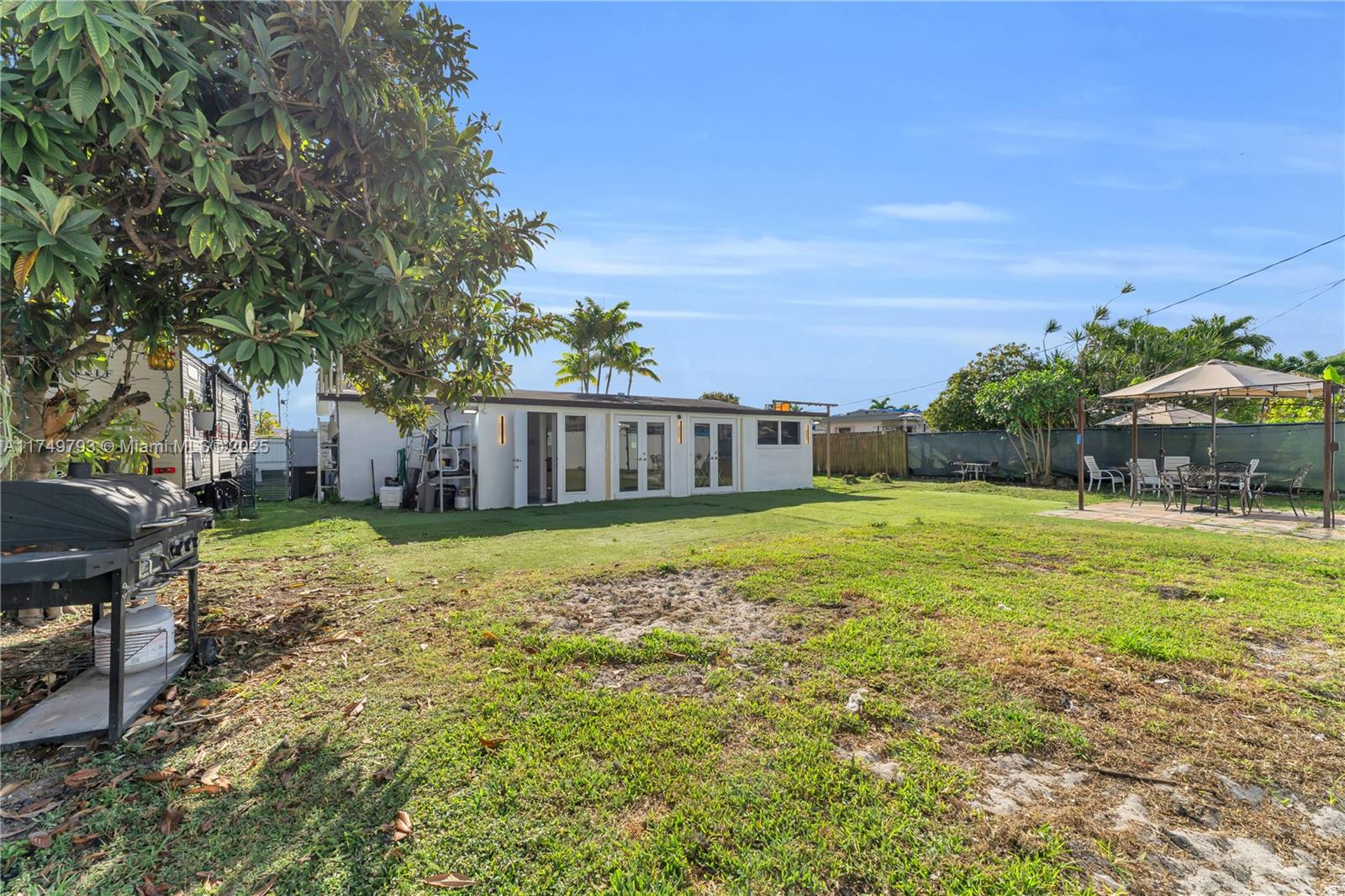 19900 Gulfstream Road Cutler Bay, FL 33157 - Photo 27 of 34 a view of a house with a yard