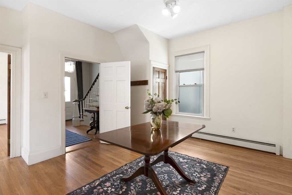 18 Briggs Street Salem, MA 01970 - Photo 13 of 43 a view of a room with furniture and wooden floor