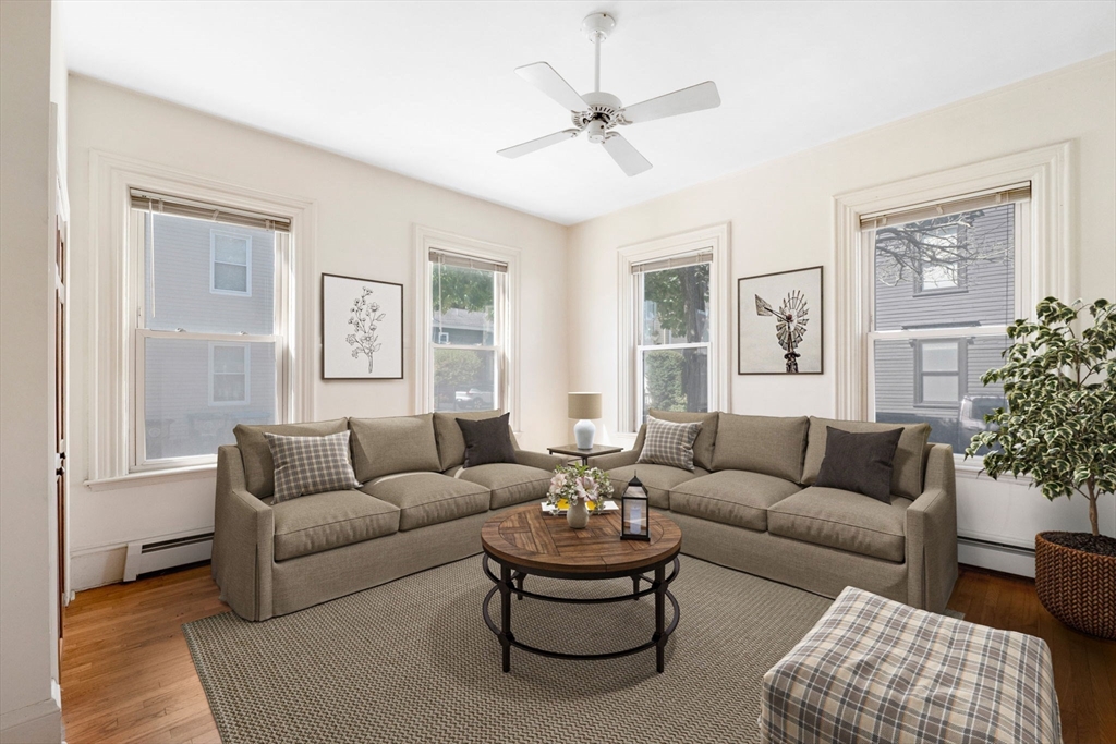 18 Briggs Street Salem, MA 01970 - Photo 15 of 43 a living room with furniture and a large window