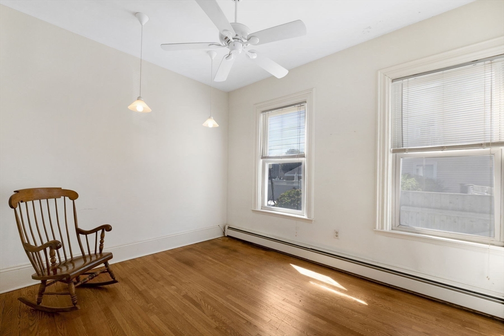18 Briggs Street Salem, MA 01970 - Photo 17 of 43 a view of a room with wooden floor and windows