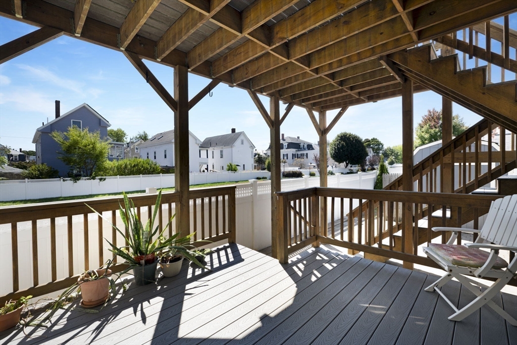 18 Briggs Street Salem, MA 01970 - Photo 22 of 43 a view of balcony with wooden floor