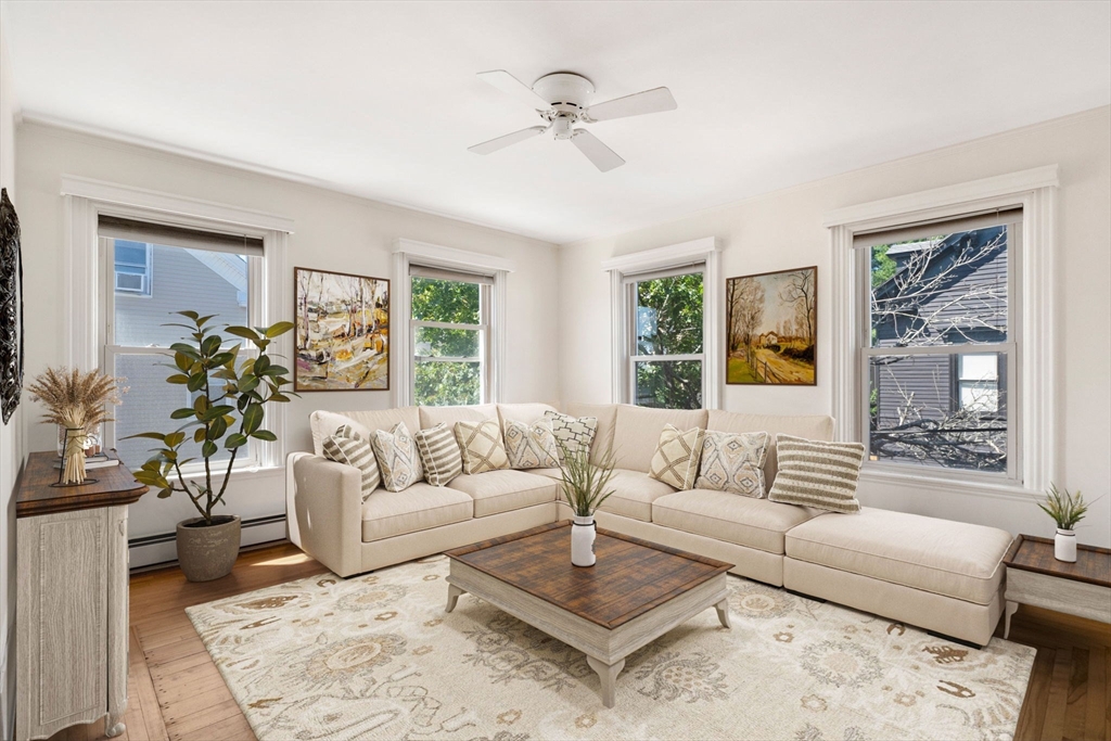 18 Briggs Street Salem, MA 01970 - Photo 25 of 43 a living room with furniture and a large window