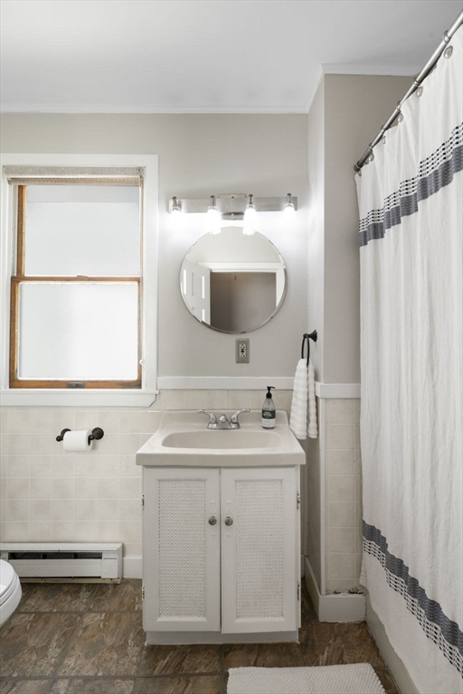 18 Briggs Street Salem, MA 01970 - Photo 29 of 43 a bathroom with a sink and a mirror
