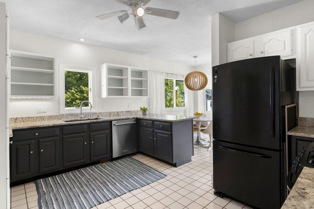 18 Briggs Street Salem, MA 01970 - Photo 30 of 43 a kitchen with a refrigerator and a sink