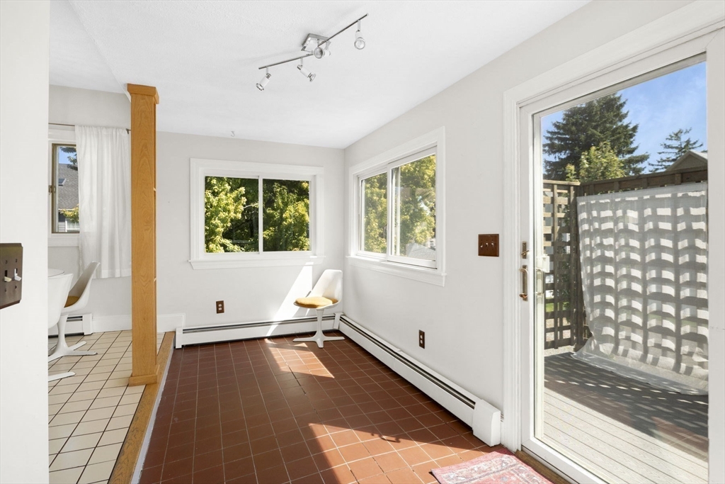 18 Briggs Street Salem, MA 01970 - Photo 33 of 43 a view of a livingroom with wooden floor and an entryway