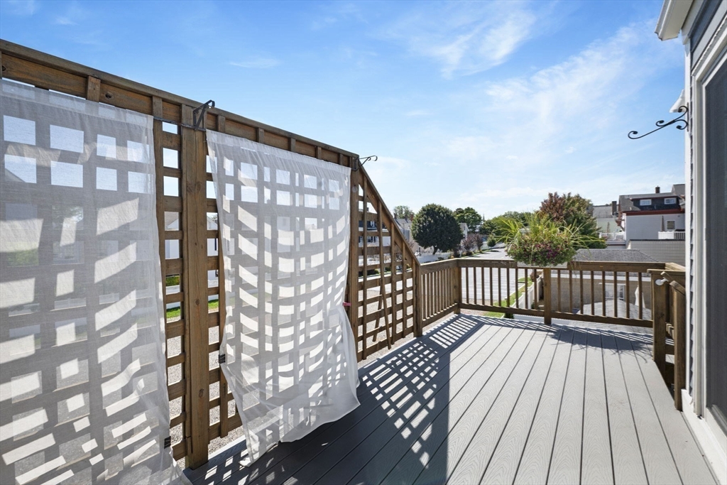 18 Briggs Street Salem, MA 01970 - Photo 34 of 43 a balcony with wooden floor and city view