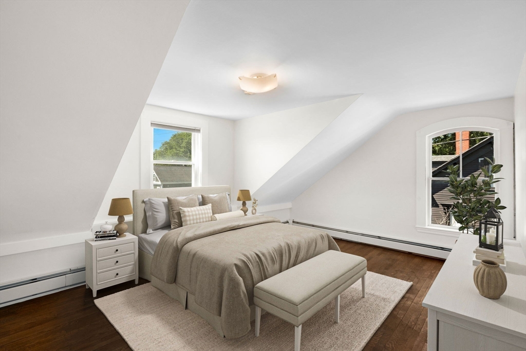 18 Briggs Street Salem, MA 01970 - Photo 39 of 43 a living room with furniture and a potted plant