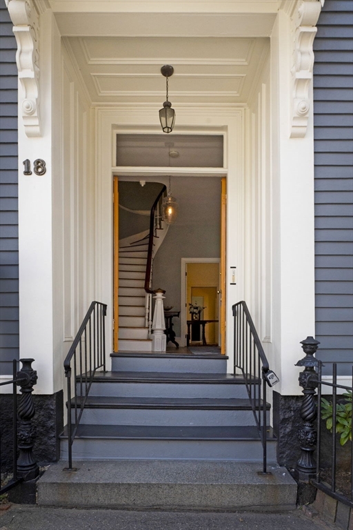 18 Briggs Street Salem, MA 01970 - Photo 6 of 43 a view of entryway and hall with wooden floor
