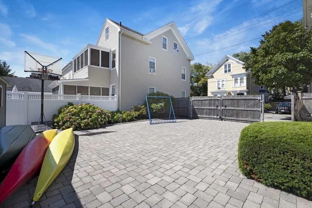 18 Briggs Street Salem, MA 01970 - Photo 9 of 43 a view of a house with backyard and sitting area