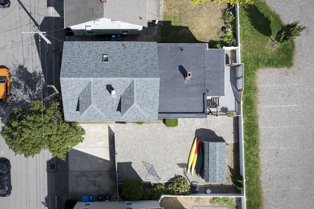 18 Briggs Street Salem, MA 01970 - Photo 10 of 43 an aerial view of residential houses with outdoor space