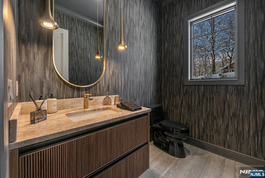 48 Brook Road Upper Saddle River, NJ 07458 - Photo 21 of 50 a bathroom with a sink and a mirror