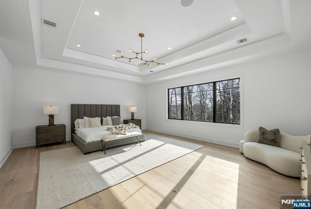 48 Brook Road Upper Saddle River, NJ 07458 - Photo 26 of 50 a living room with furniture and a large window