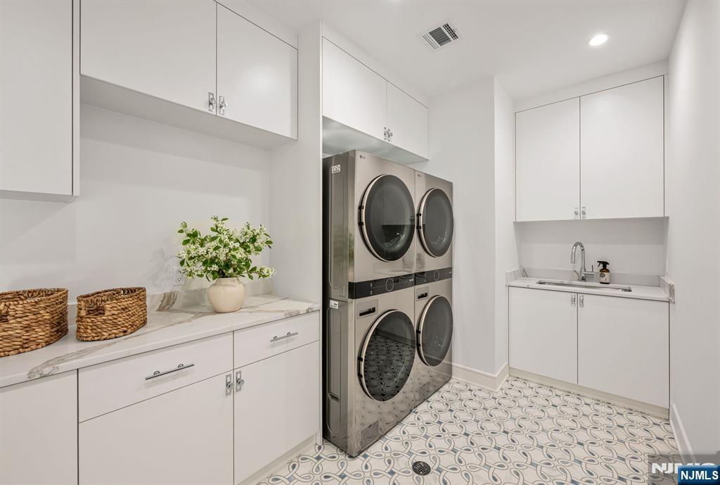 48 Brook Road Upper Saddle River, NJ 07458 - Photo 37 of 50 a utility room with sink dryer and washer