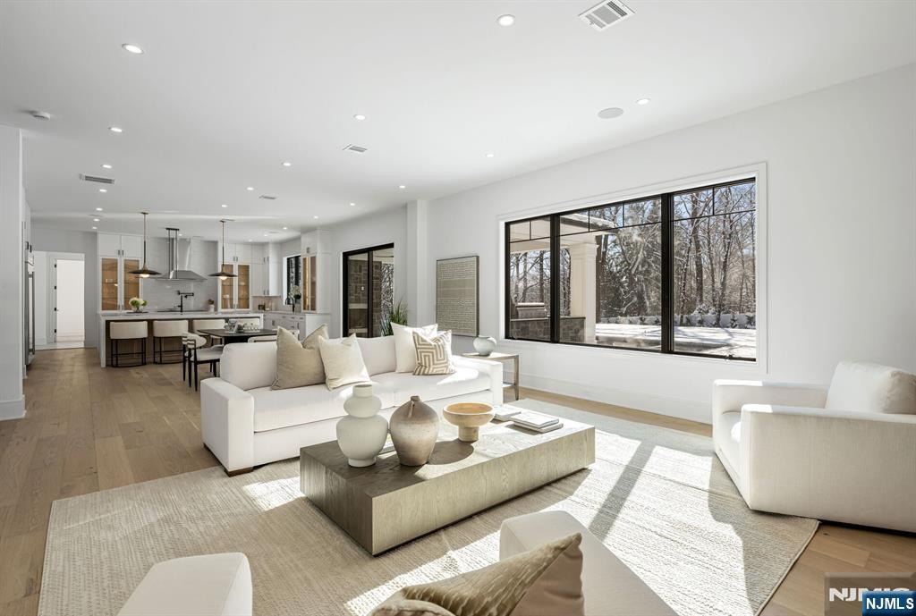 48 Brook Road Upper Saddle River, NJ 07458 - Photo 6 of 50 a living room with furniture and a large window