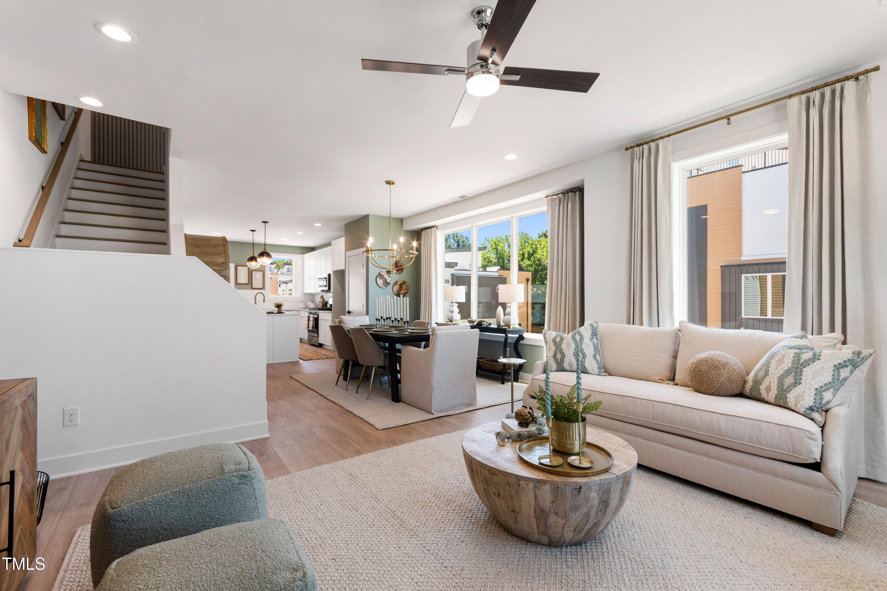 1313 Garner Road, Unit 101 Raleigh, NC 27610 - Photo 38 of 80 a living room with furniture and a large window