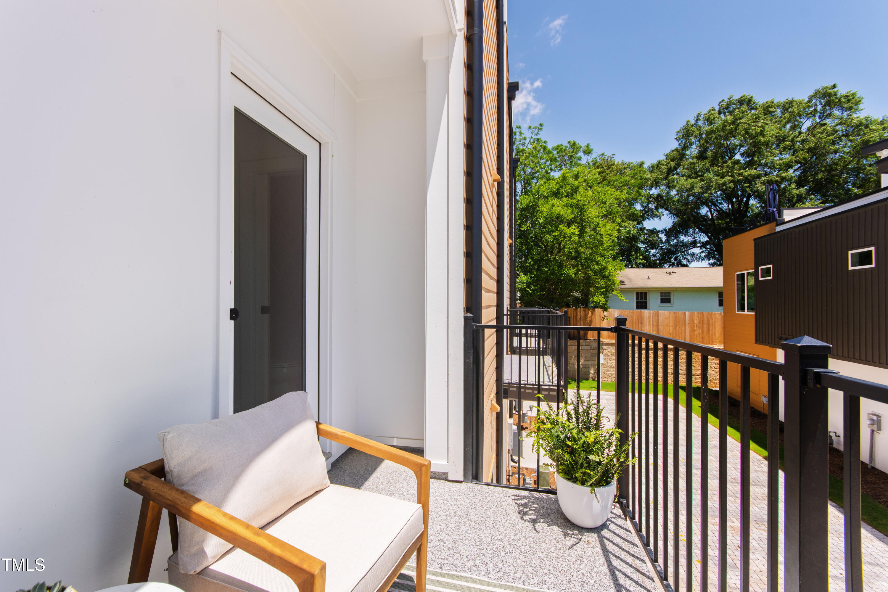 1313 Garner Road, Unit 101 Raleigh, NC 27610 - Photo 40 of 80 a view of a balcony with furniture