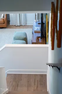 a view of a hallway with staircase